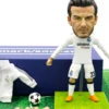 17 FIGURA D. BECKHAM REAL MADRID DE 12CM